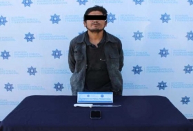 Robo un celular y es detenido