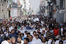 El contingente salió de la Avenida Juárez con dirección al zócalo de Puebla 